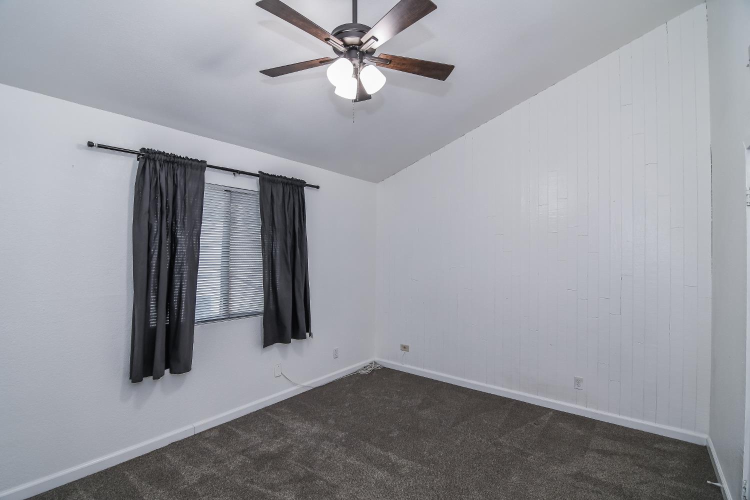 1139 Rivara Circle Sacramento, CA 95864 - Photo 41 of 72 an empty room with closet and a ceiling fan