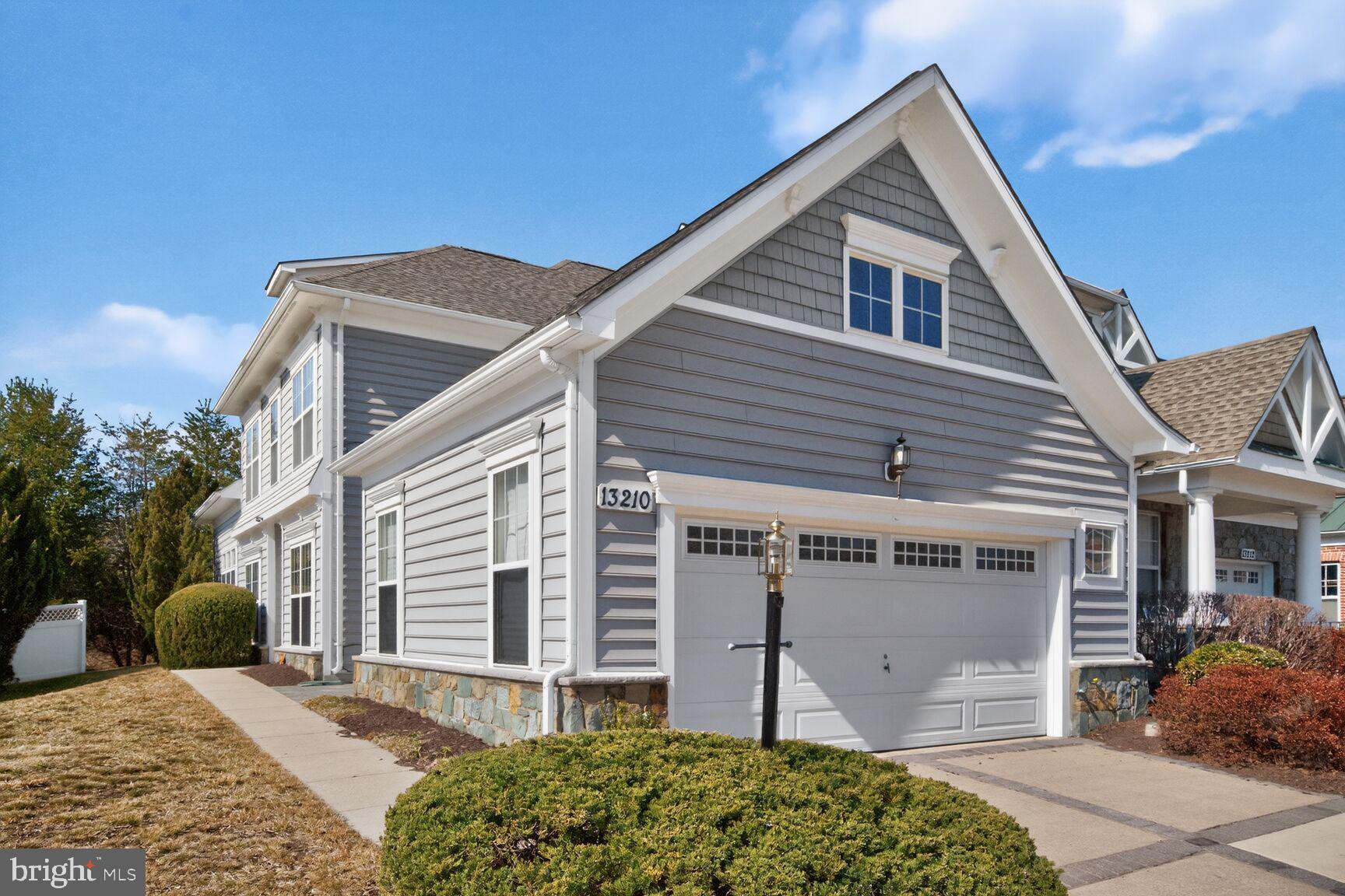 13210 Rabbit Chase Road Laurel, MD 20707 - Photo 1 of 40 a front view of a house with a yard