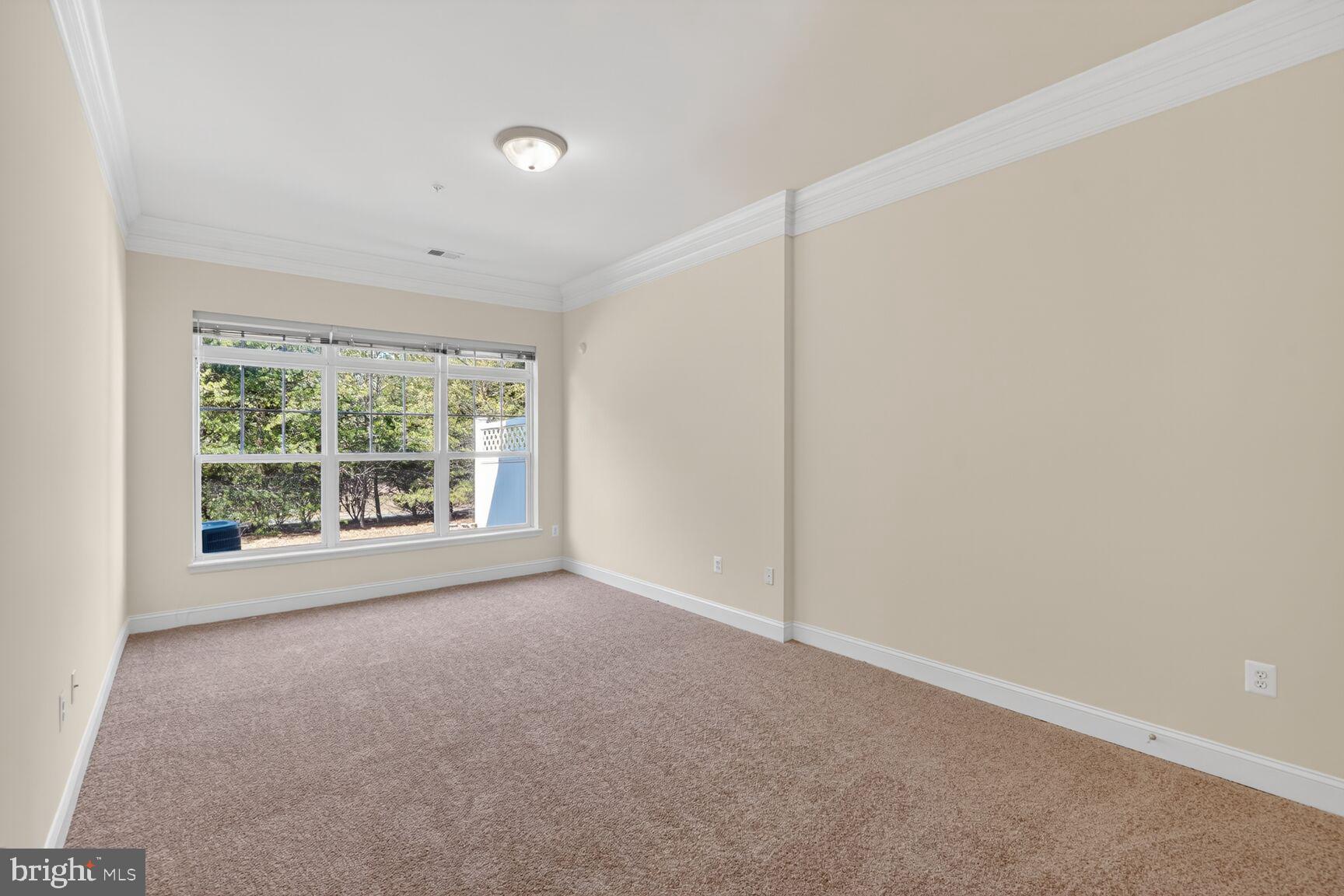 13210 Rabbit Chase Road Laurel, MD 20707 - Photo 16 of 40 a view of an empty room with a window