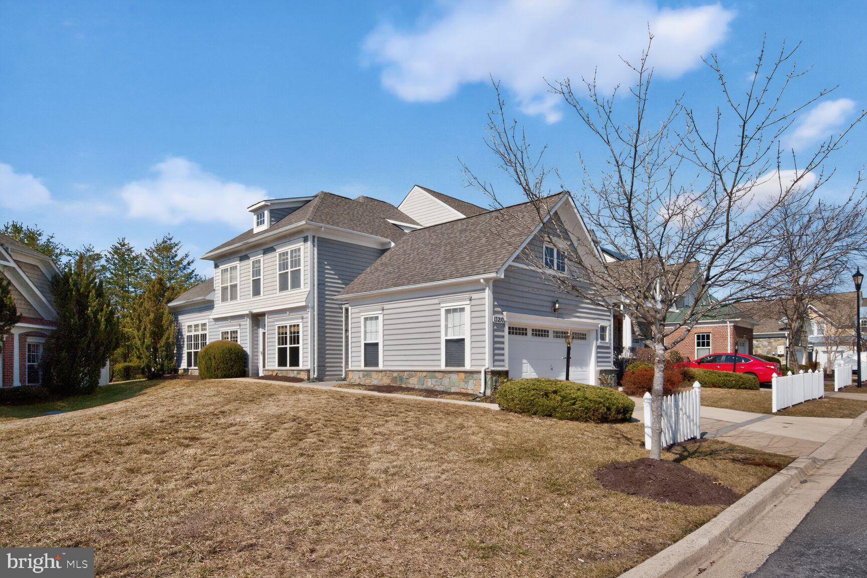 13210 Rabbit Chase Road Laurel, MD 20707 - Photo 2 of 40 a front view of a house with cars parked