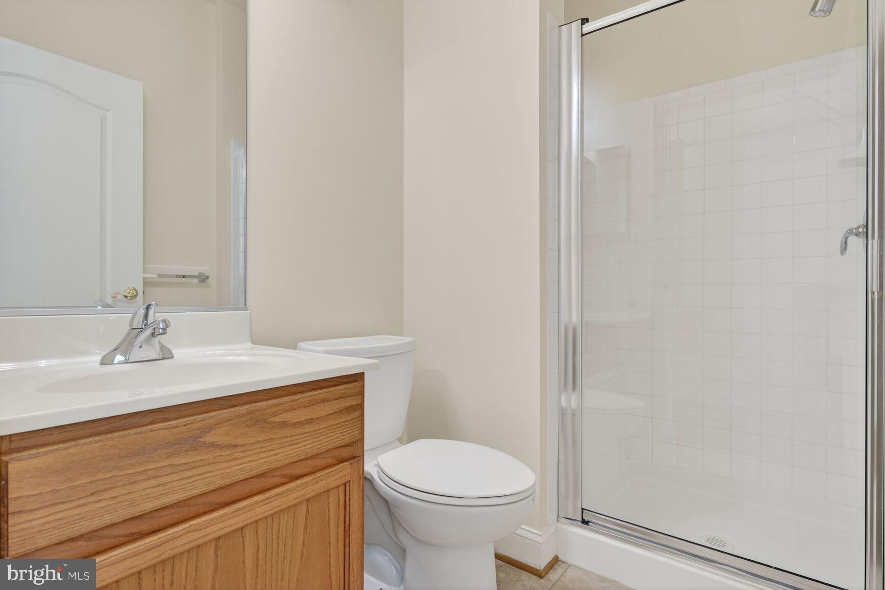 13210 Rabbit Chase Road Laurel, MD 20707 - Photo 24 of 40 a bathroom with a sink toilet and vanity