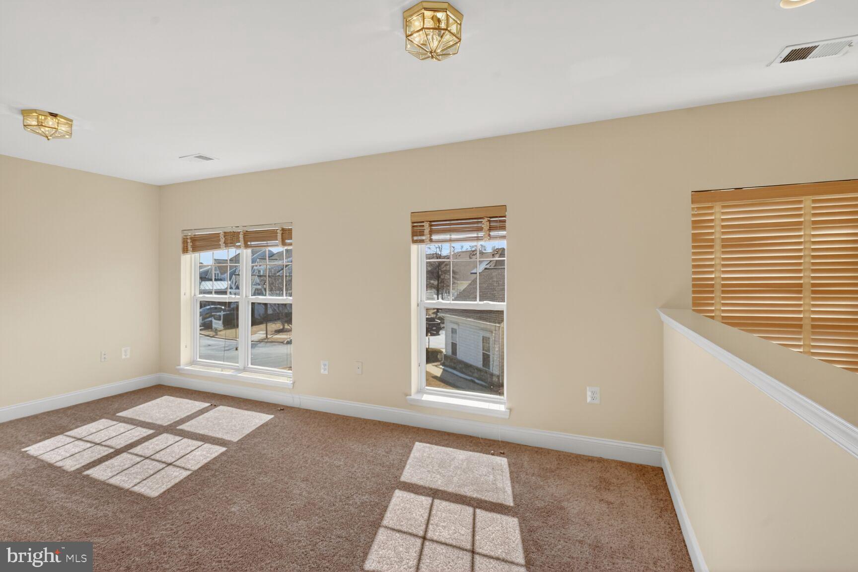 13210 Rabbit Chase Road Laurel, MD 20707 - Photo 30 of 40 a view of an empty room with a window