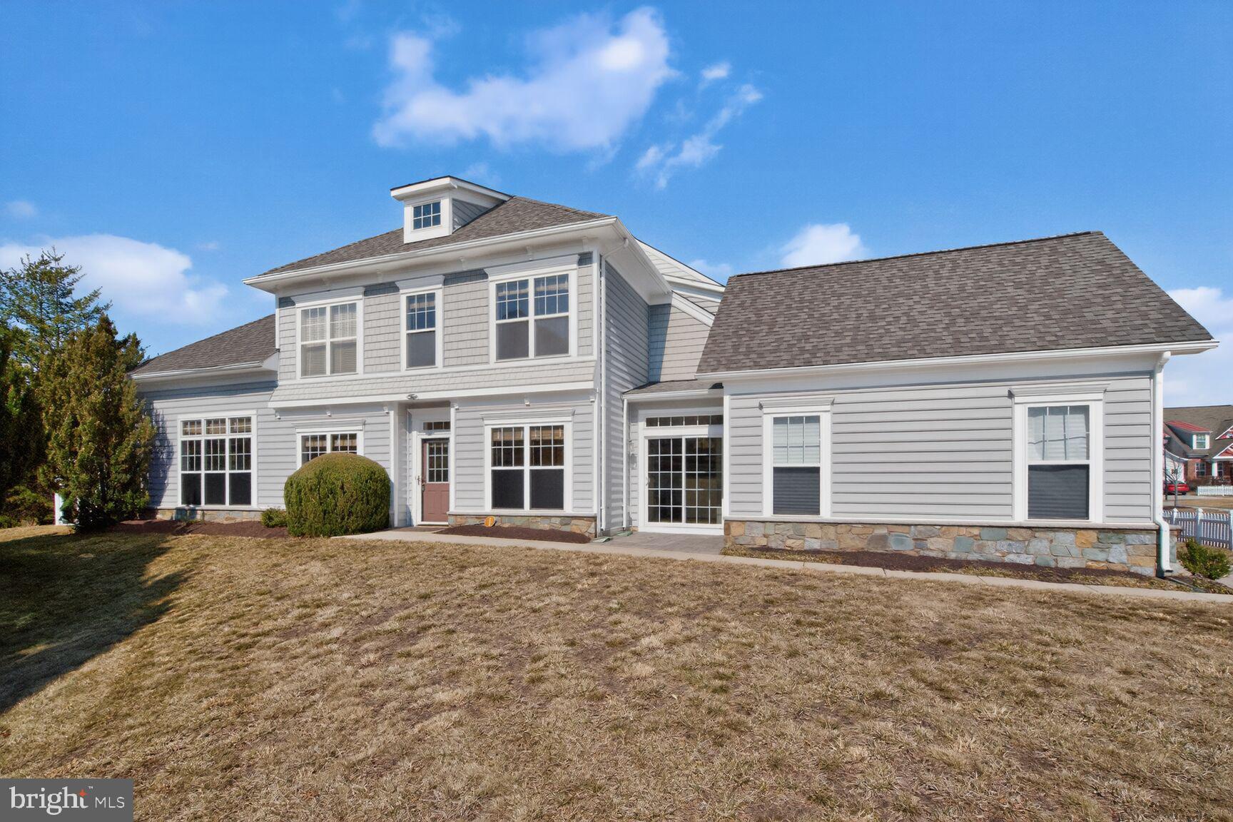 13210 Rabbit Chase Road Laurel, MD 20707 - Photo 3 of 40 a front view of a house with a garden