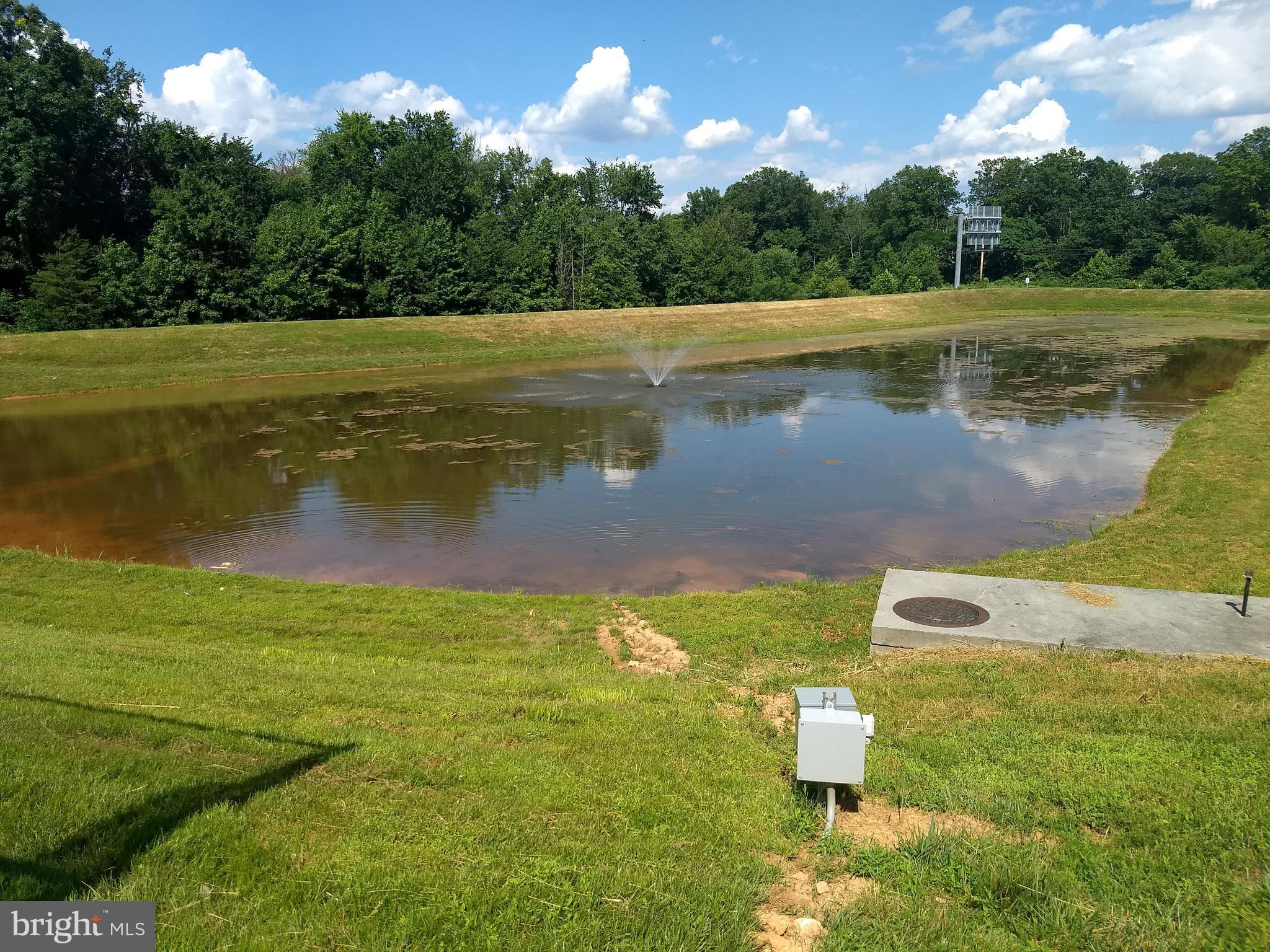 13210 Rabbit Chase Road Laurel, MD 20707 - Photo 36 of 40 a view of a lake with a yard
