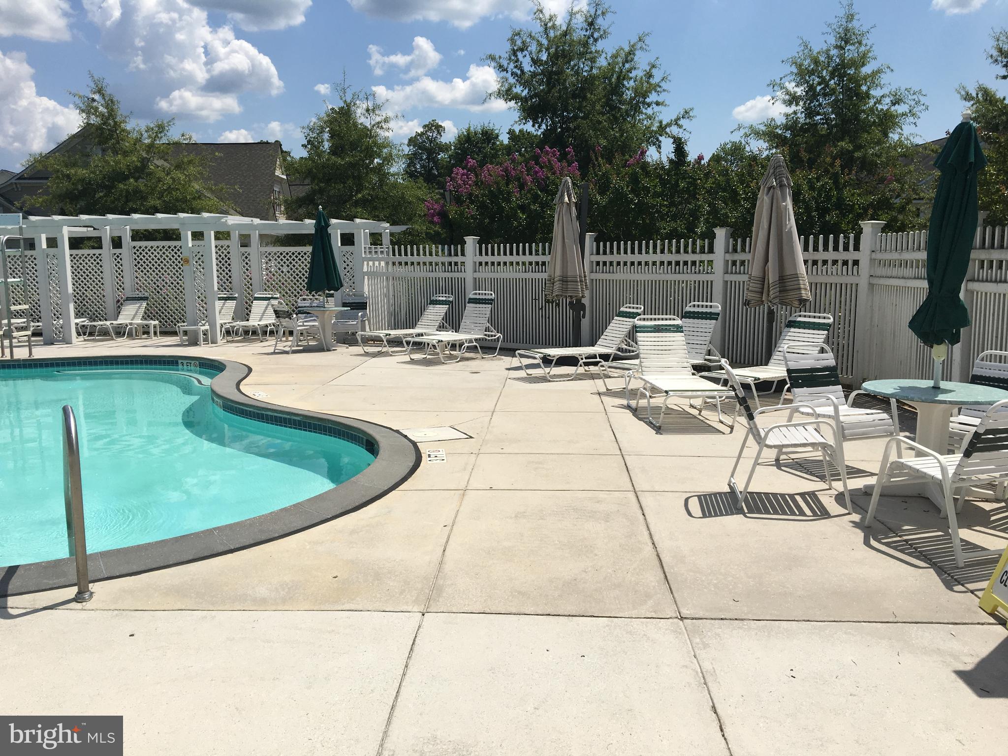 13210 Rabbit Chase Road Laurel, MD 20707 - Photo 38 of 40 a view of a swimming pool with a patio