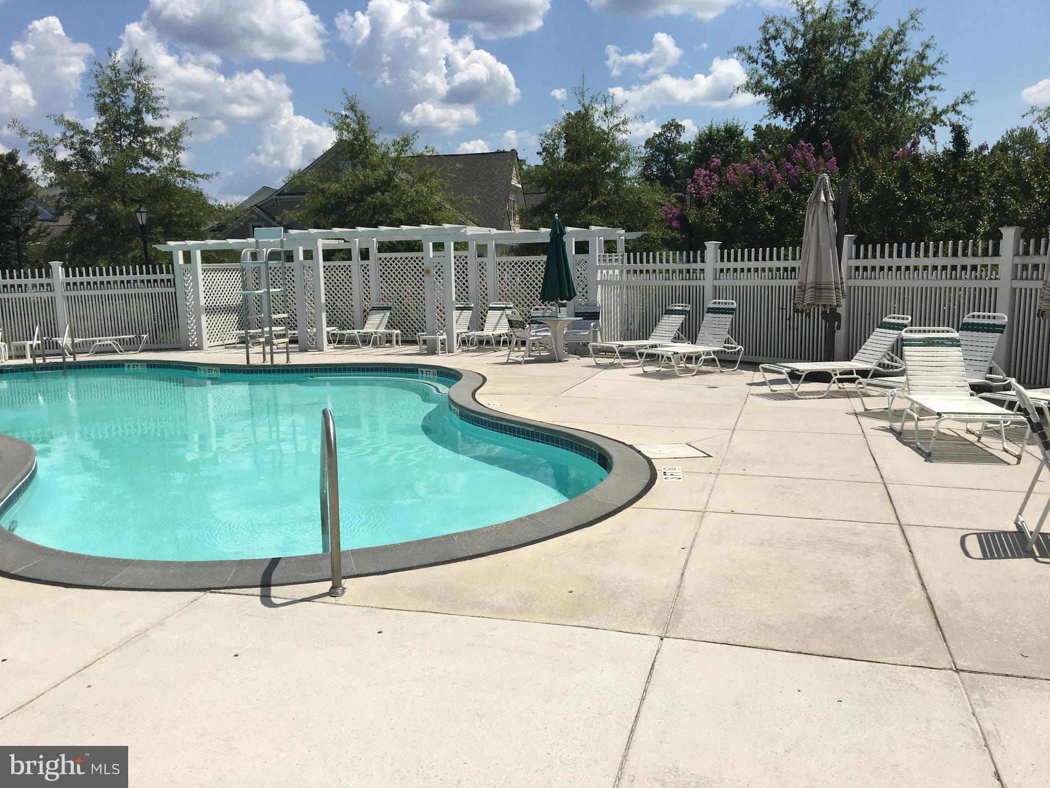 13210 Rabbit Chase Road Laurel, MD 20707 - Photo 39 of 40 a view of a swimming pool with a patio