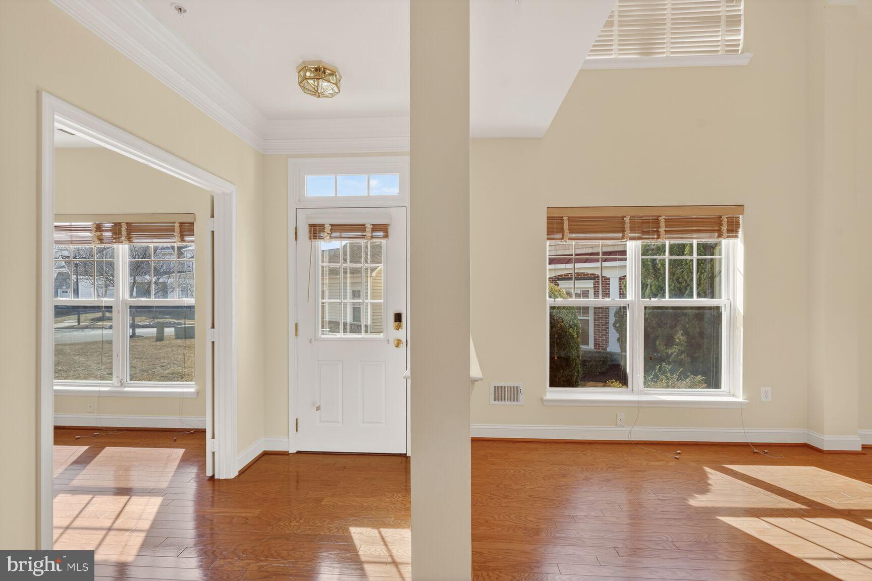 13210 Rabbit Chase Road Laurel, MD 20707 - Photo 5 of 40 a view of an empty room with a window