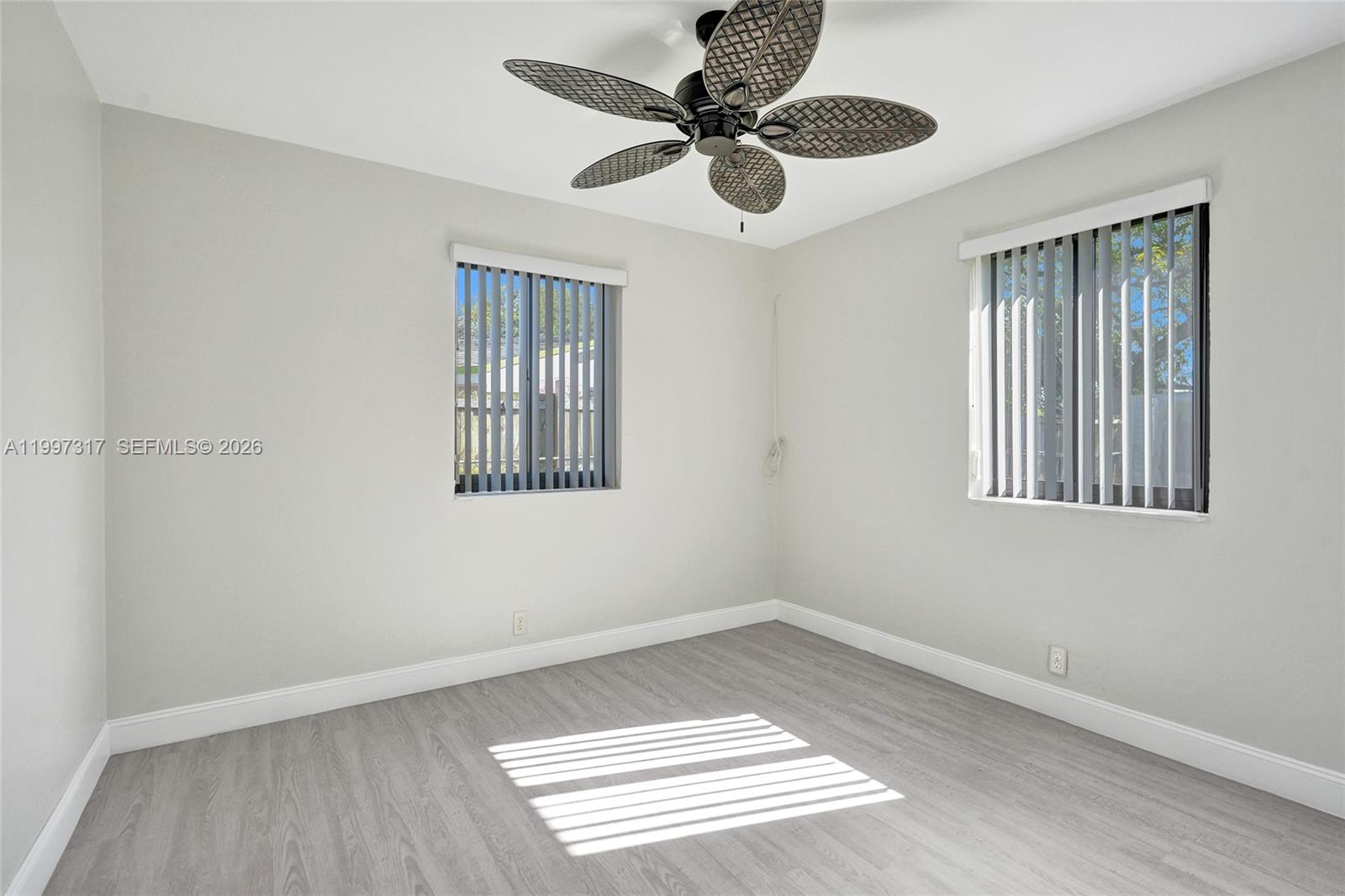 136 Miami Gardens Road West Park, FL 33023 - Photo 28 of 44 a view of an empty room with a window