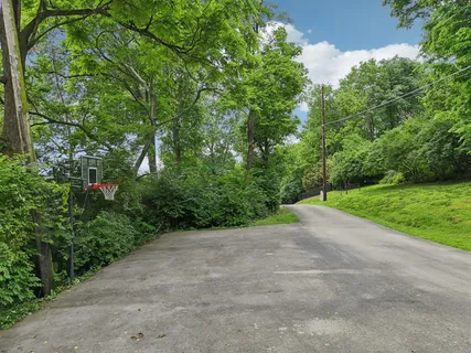 a view of a road with a yard