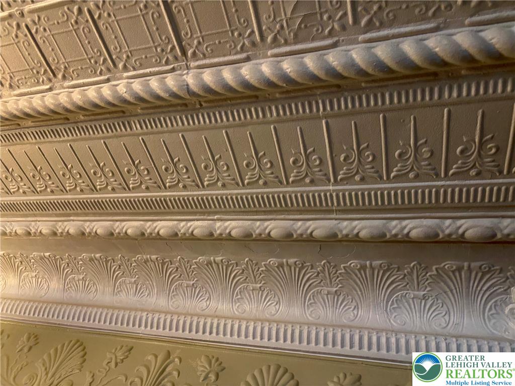 7241 Decatur Street New Tripoli, PA 18066 - Photo 7 of 36 Ornate ceiling moldings create a grand and historic atmosphere.