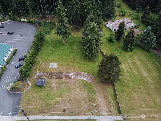 a view of a garden and basketball court