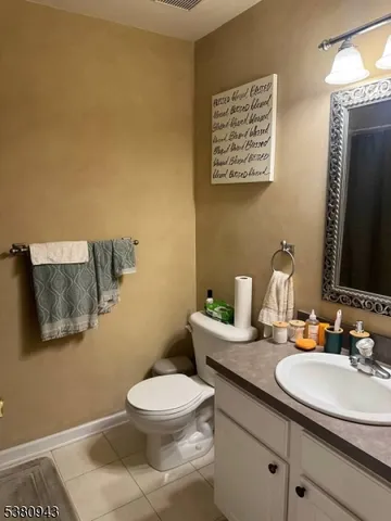 a bedroom with bed and window