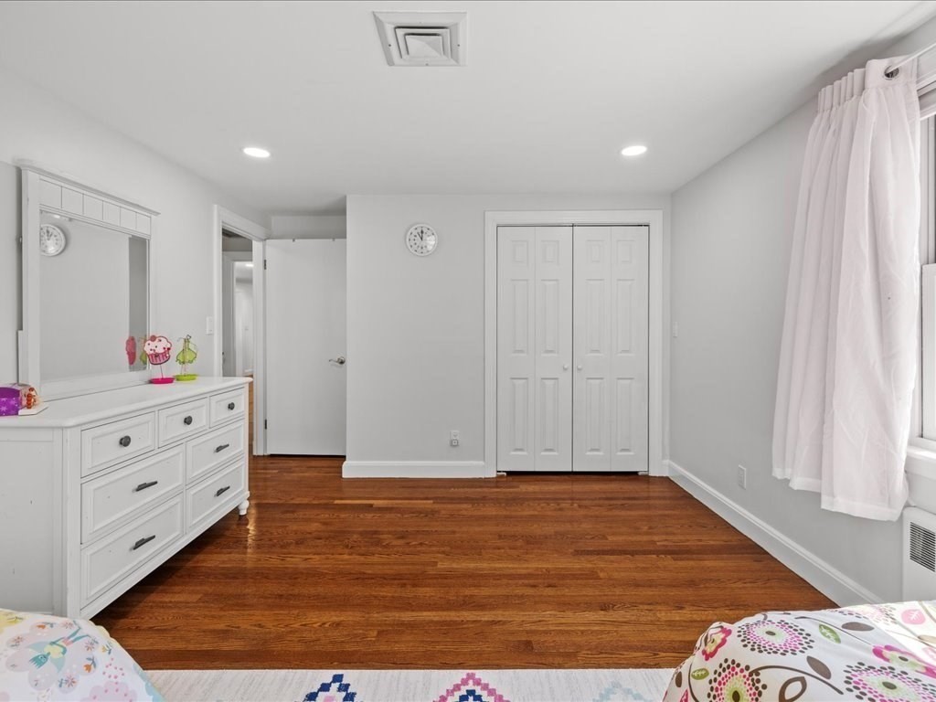 39 Broad Meadow Road Needham, MA 02492 - Photo 26 of 36 a view of bedroom with furniture and wooden floor