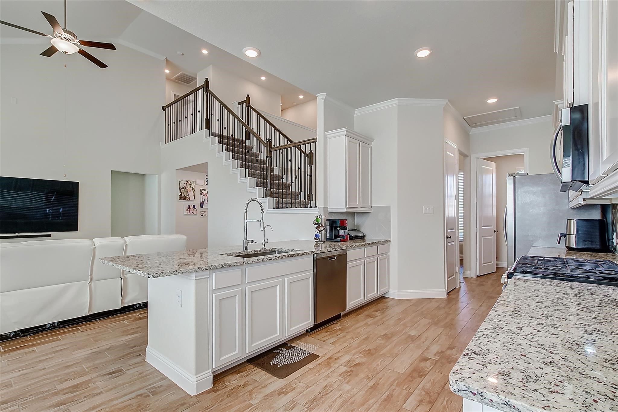 2318 Madera Landing Lane Rosenberg, TX 77469 - Photo 4 of 21 Kitchen and Living Area