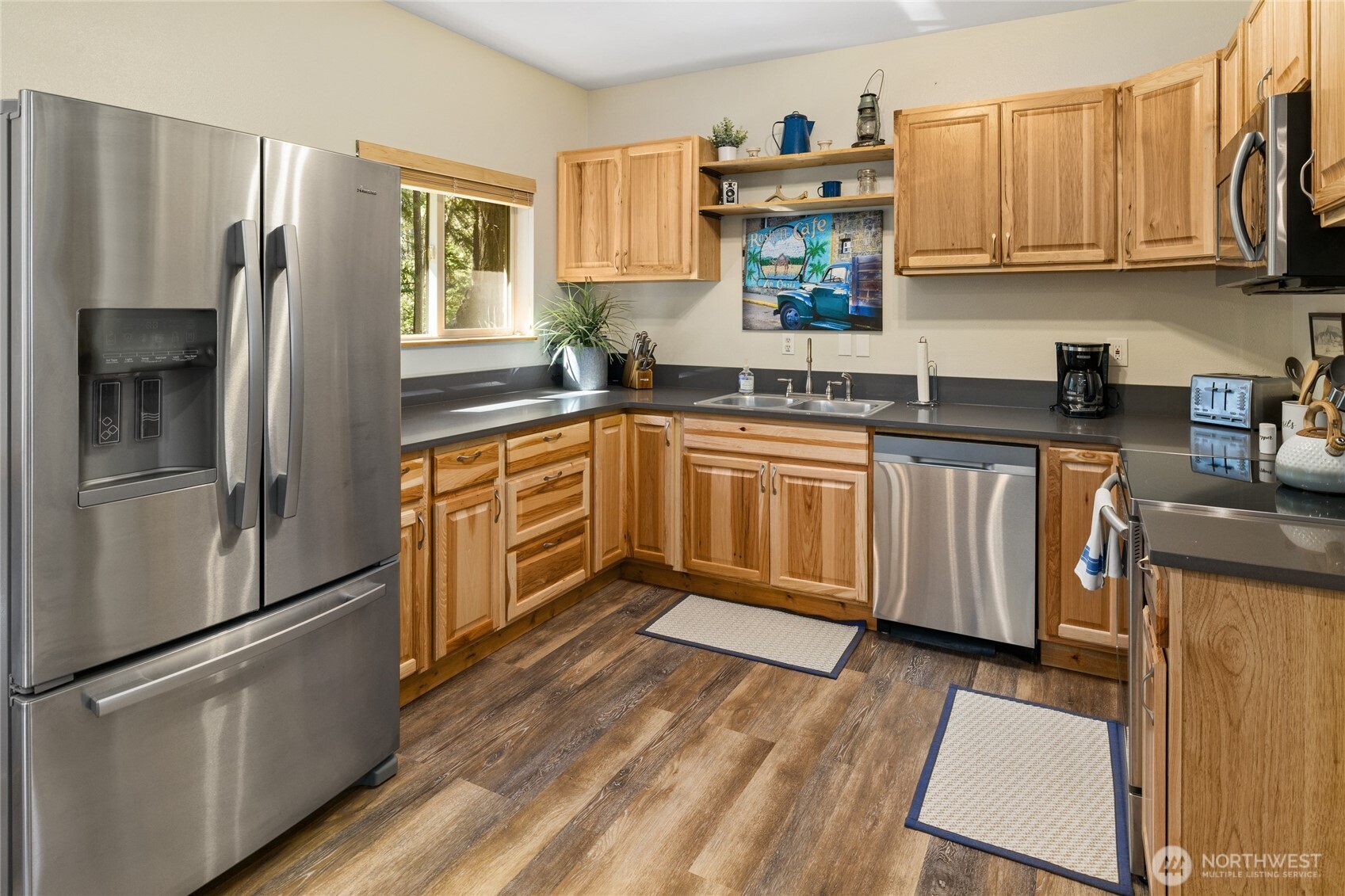 401 Whyworry Lane Ronald, WA 98940 - Photo 5 of 23 a kitchen with stainless steel appliances granite countertop a refrigerator sink and microwave