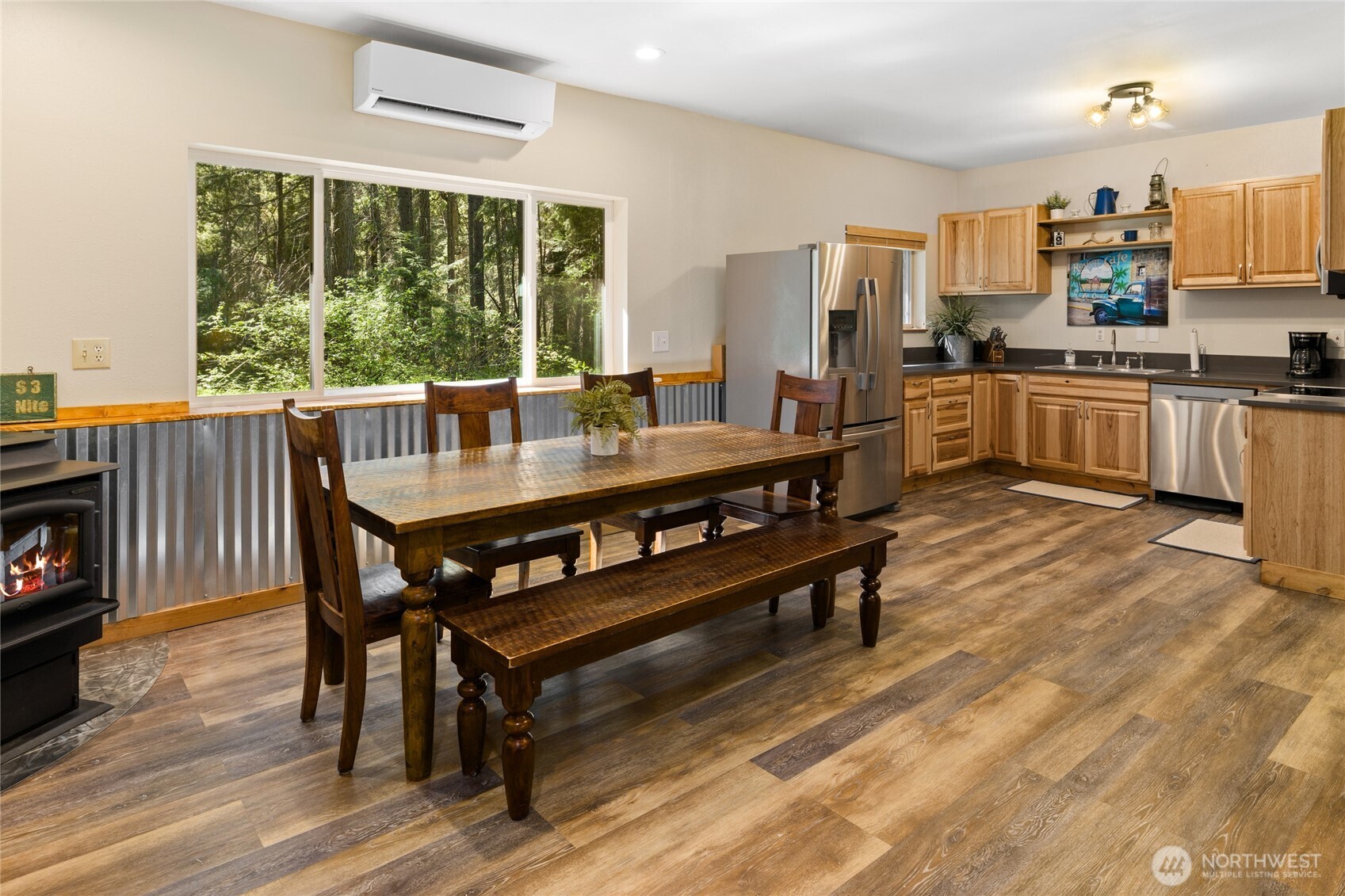 401 Whyworry Lane Ronald, WA 98940 - Photo 7 of 23 a dining room with a table chairs and a kitchen view