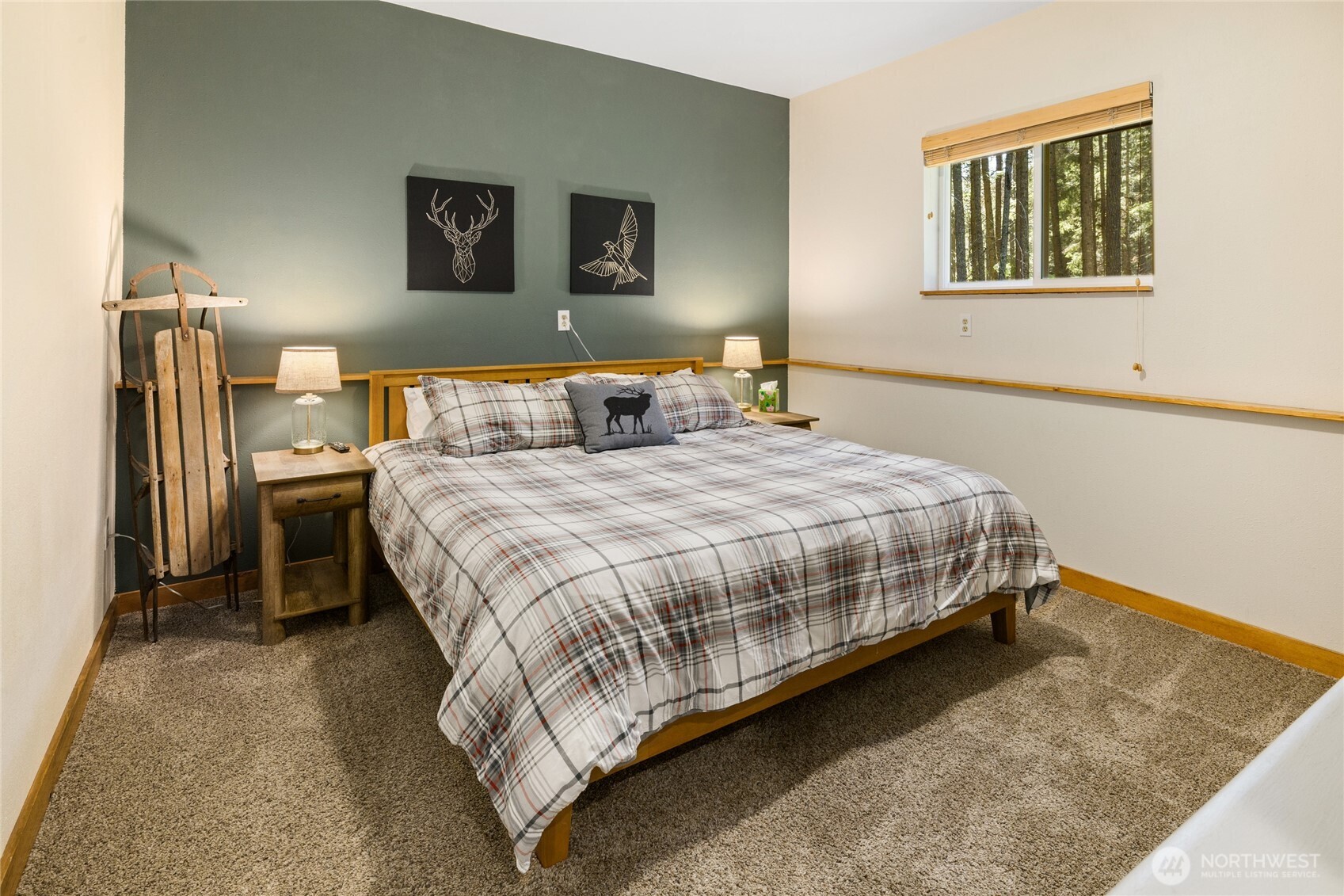 401 Whyworry Lane Ronald, WA 98940 - Photo 10 of 23 a bedroom with a bed and painting on the wall