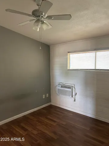 a view of a chandelier fan in a room