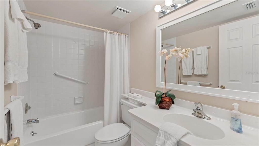 450 Cerromar Road, Unit 282 Venice, FL 34293 - Photo 21 of 44 a bathroom with a sink toilet and shower