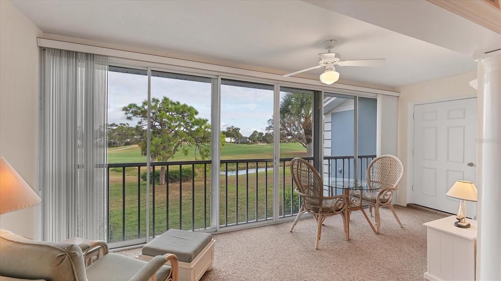 450 Cerromar Road, Unit 282 Venice, FL 34293 - Photo 23 of 44 a view of a balcony with furniture and a window