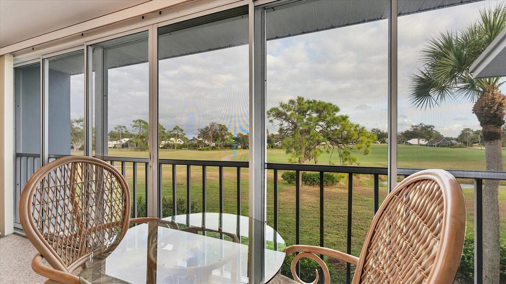 450 Cerromar Road, Unit 282 Venice, FL 34293 - Photo 25 of 44 a view of a city from a balcony