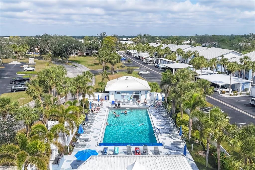 450 Cerromar Road, Unit 282 Venice, FL 34293 - Photo 29 of 44 a view of a lake with a yard