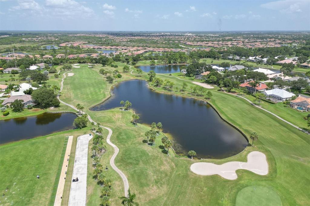 450 Cerromar Road, Unit 282 Venice, FL 34293 - Photo 44 of 44 a view of a lake with a city