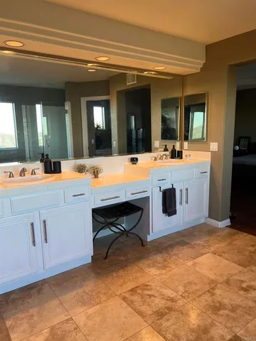 a room with pool table and flat screen tv