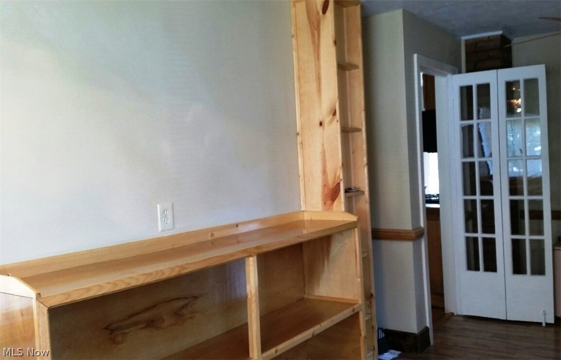 3454 Warren Road Cleveland, OH 44111 - Photo 25 of 25 Bi-fold doors lead to the kitchen off the back hallway/office area. Great floorplan