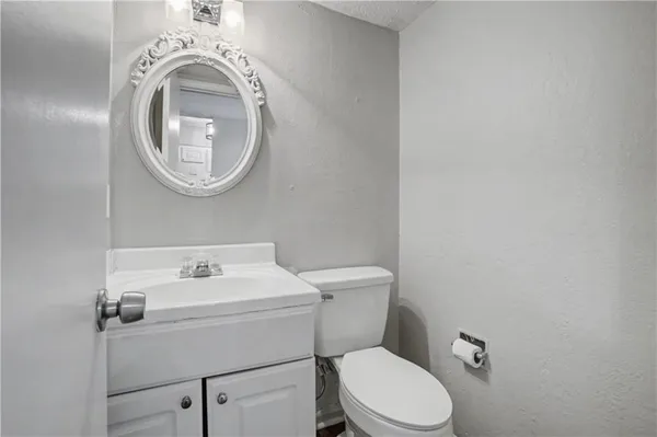 a bathroom with a sink and a toilet