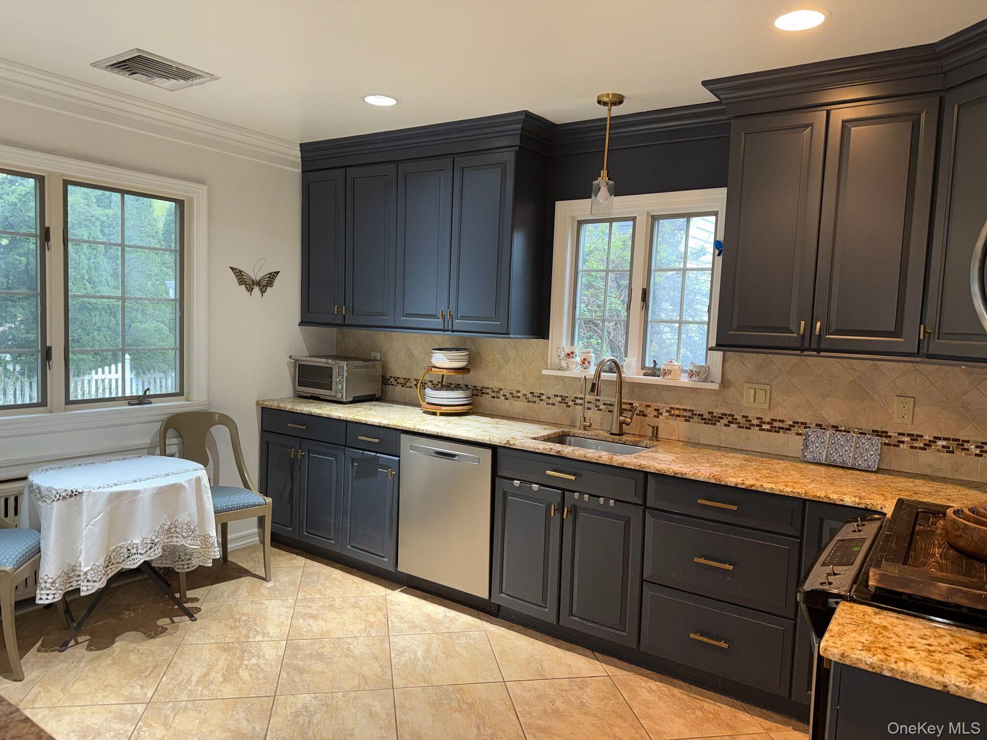 37 Eimer Street Tappan, NY 10983 - Photo 6 of 16 a spacious bathroom with a sink double vanity and a mirror