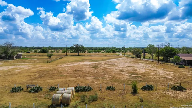 a cars parked in the middle of a field