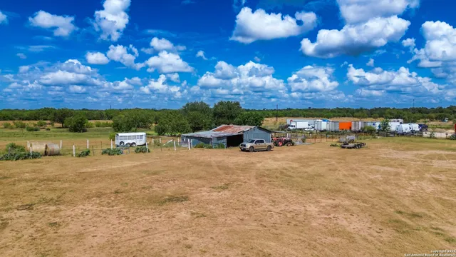 a view of a yard with an outdoor space