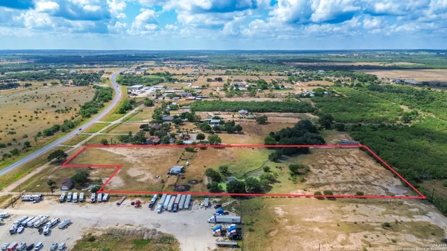 a view of a lake with a yard