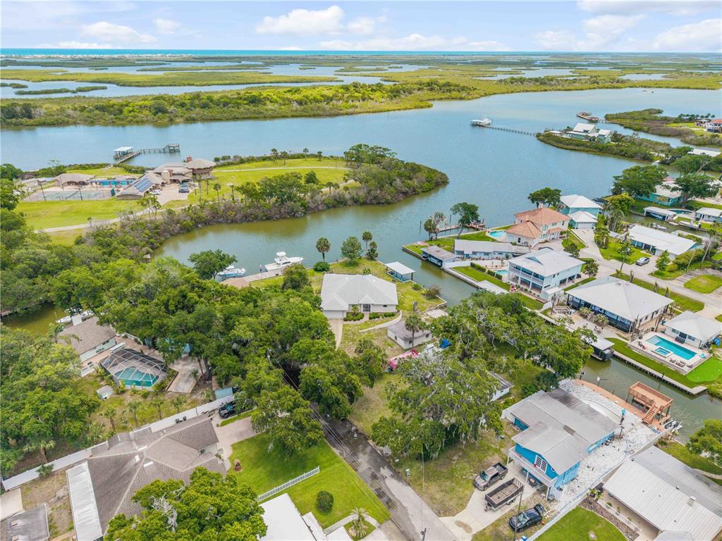 192 Azalea Road Edgewater, FL 32141 - Photo 86 of 94 a view of an ocean and a building