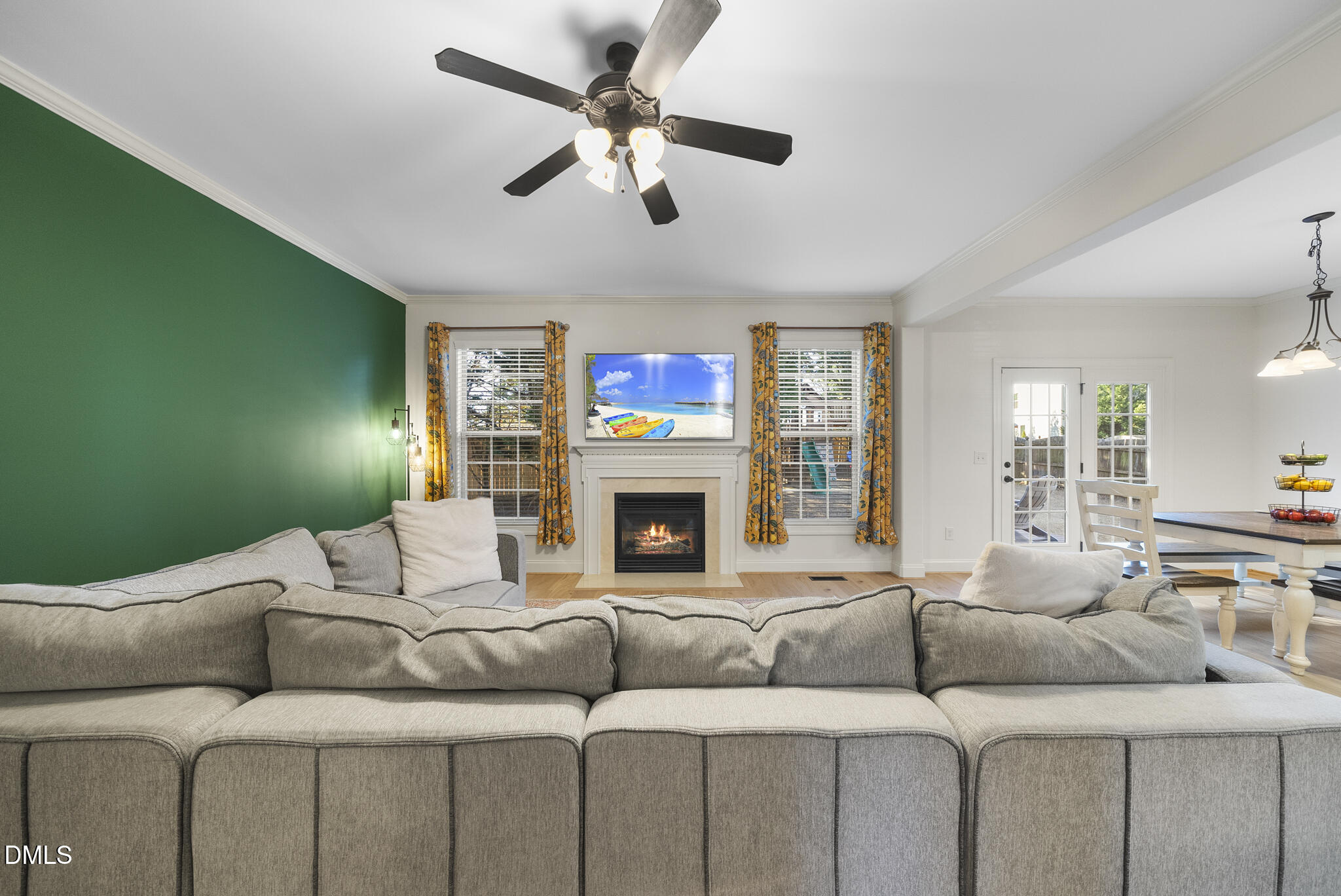 437 Big Willow Way Rolesville, NC 27571 - Photo 11 of 43 a living room with furniture and a fireplace