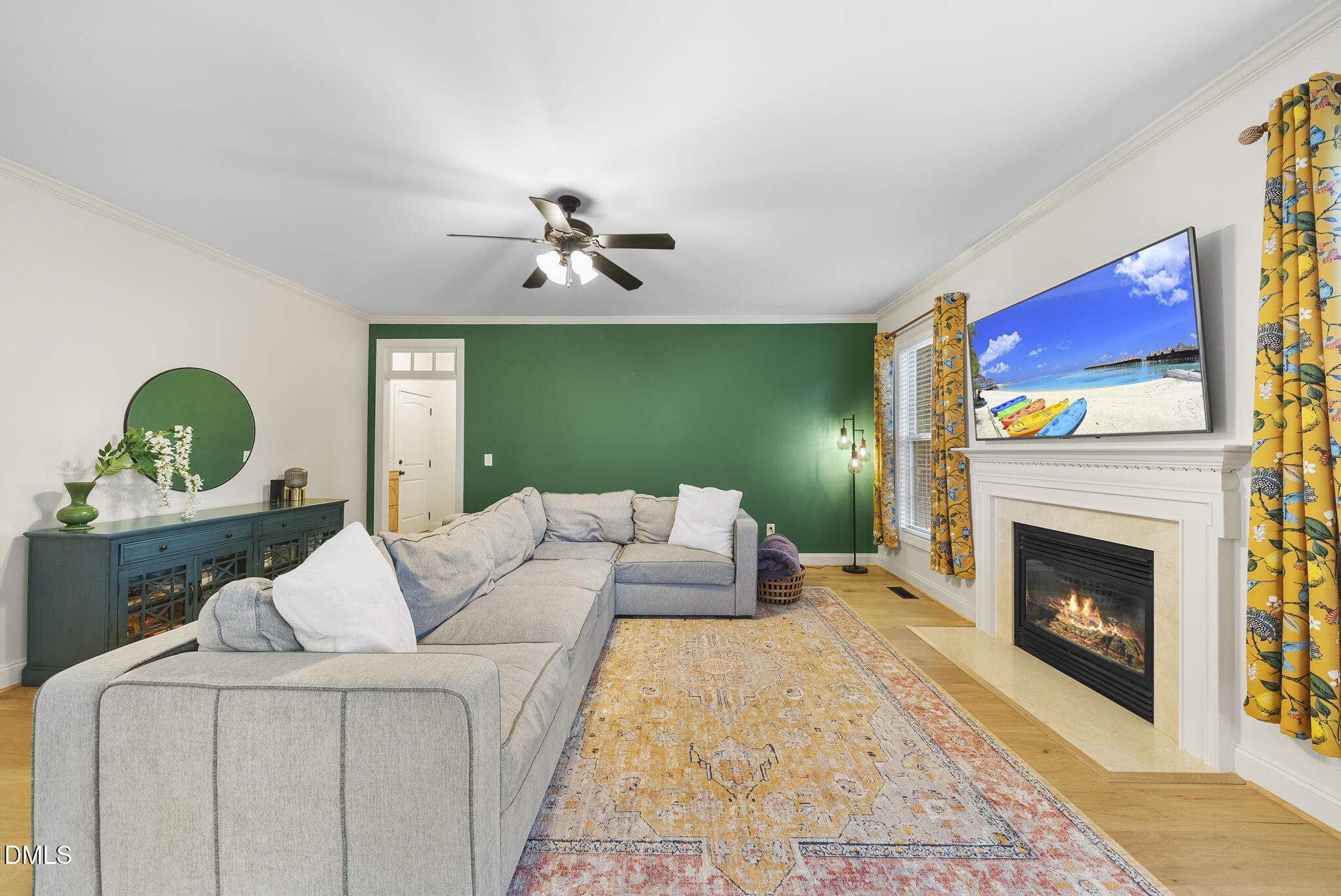 437 Big Willow Way Rolesville, NC 27571 - Photo 13 of 43 a living room with furniture and a fireplace