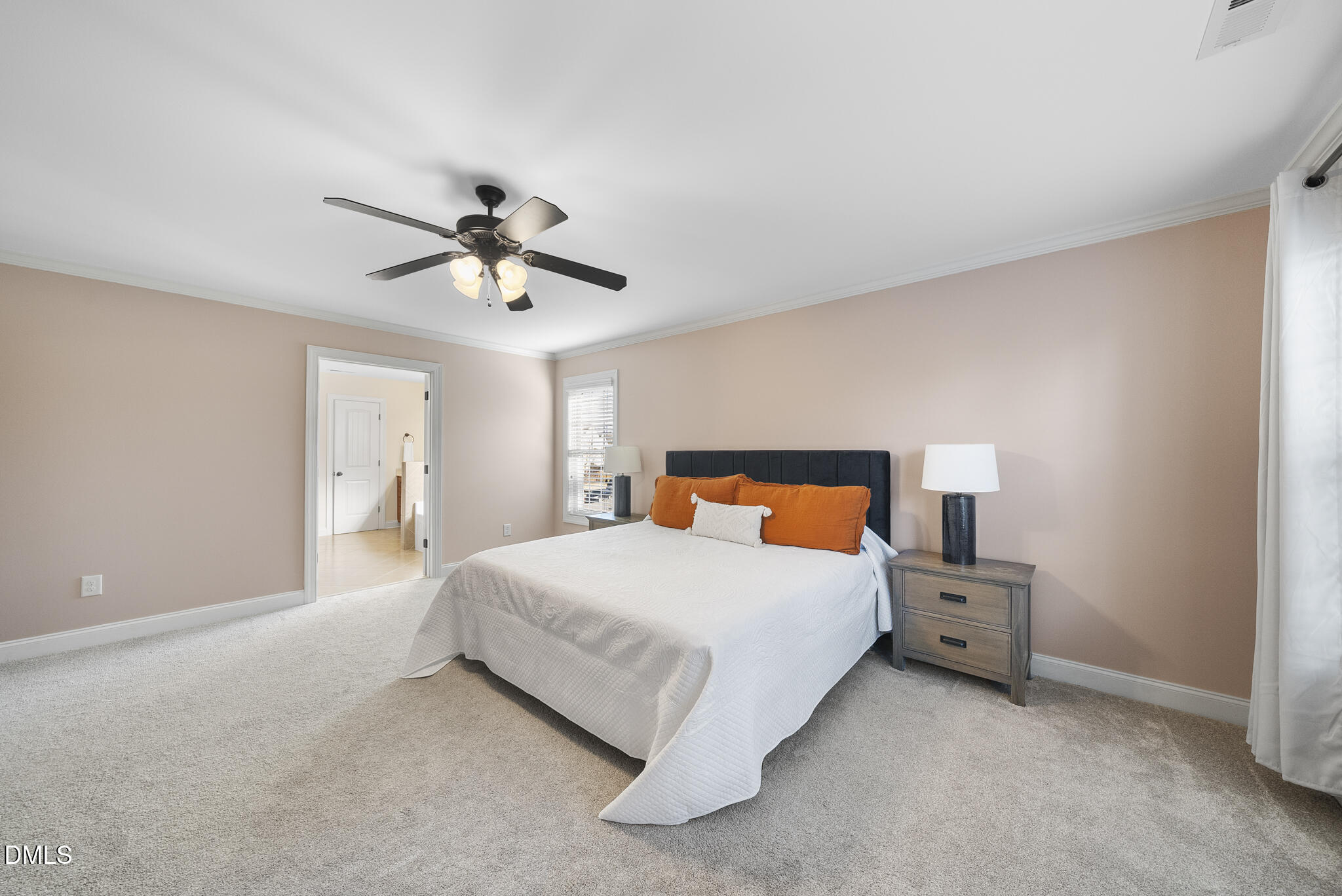 437 Big Willow Way Rolesville, NC 27571 - Photo 22 of 43 a bedroom with a bed and a ceiling fan