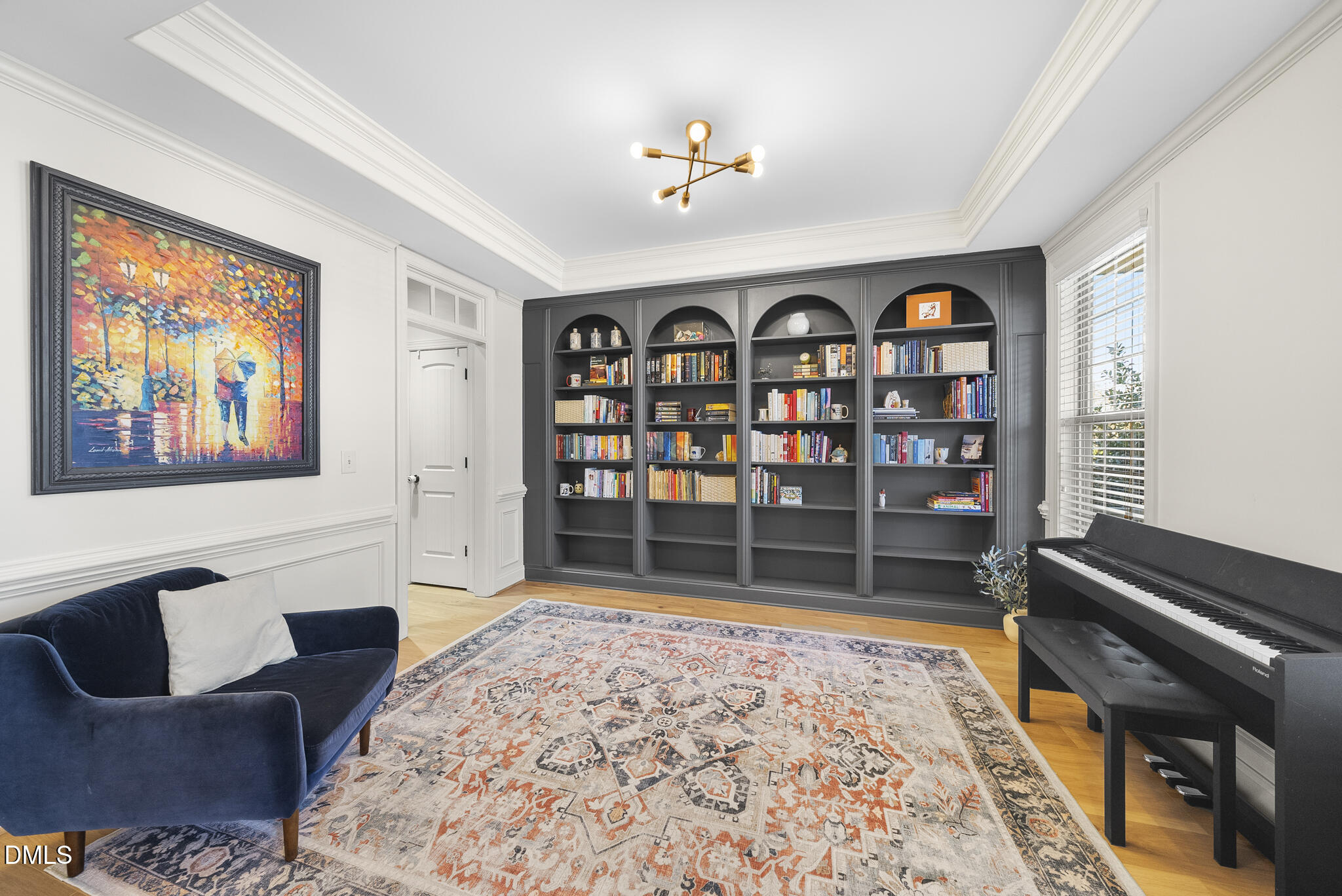 437 Big Willow Way Rolesville, NC 27571 - Photo 9 of 43 a living room with fish tank and a rug