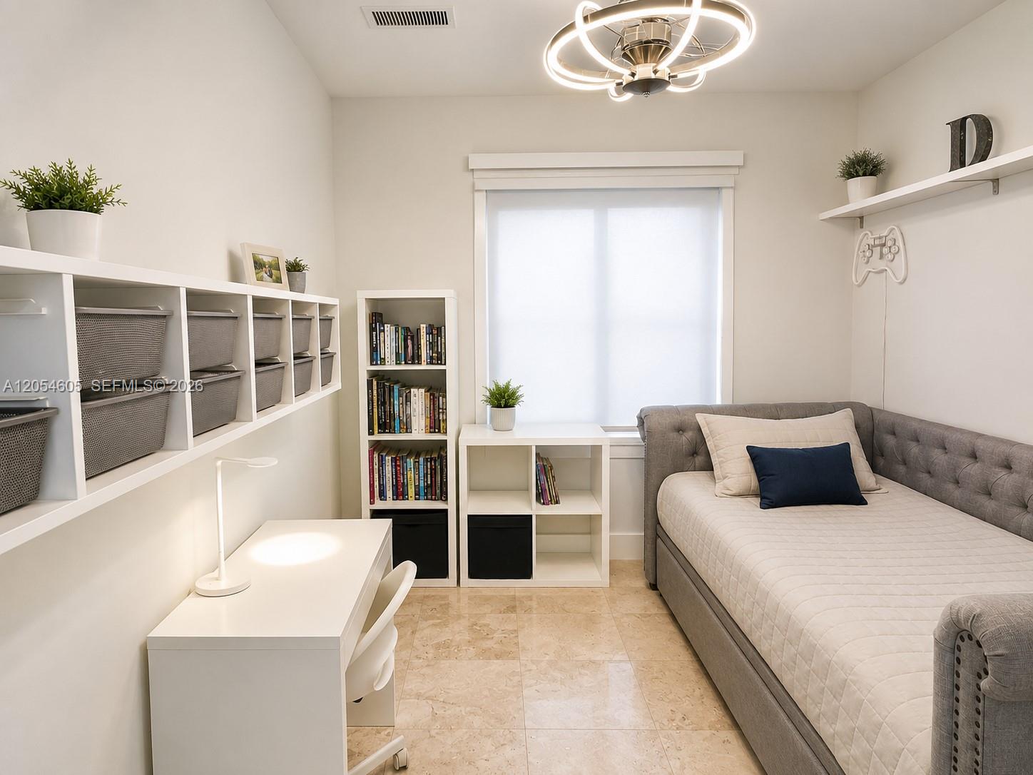 3538 Southwest 1st Avenue, Unit 1 Miami, FL 33145 - Photo 12 of 20 Bright and versatile third bedroom with direct access to a convenient Jack-and-Jill bathroom, making it ideal for children, guests, or a home office. Thoughtfully designed with excellent natural light, generous storage, and flexible space for sleeping, studying, or working from home. A comfortable and functional room that adapts easily to your family's changing needs.