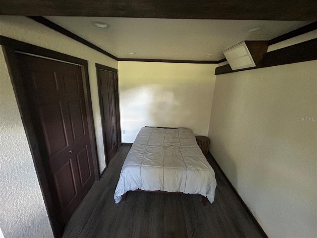 15455 Northwest 100th Avenue Road Reddick, FL 32686 - Photo 10 of 10 a view of wooden floor