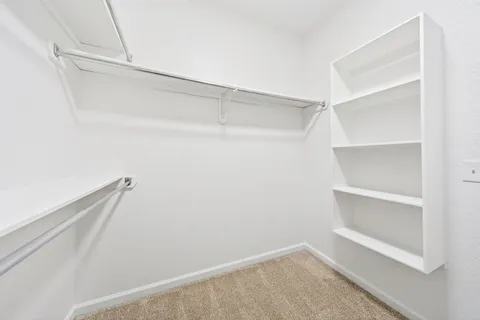 a view of staircase with white walls