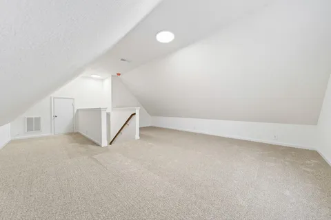 a building with a dry back yard