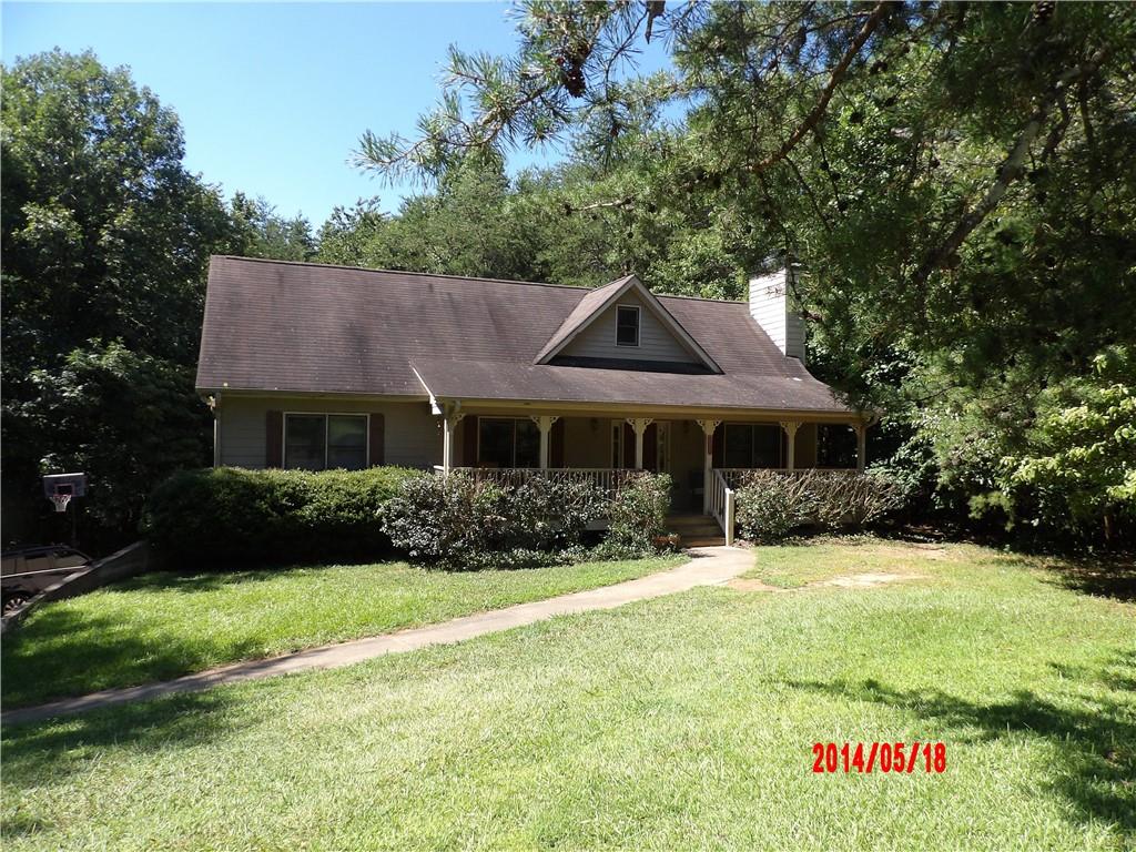 104 Chimney Way Fairmount, GA 30139 - Photo 1 of 1 a front view of a house with a garden