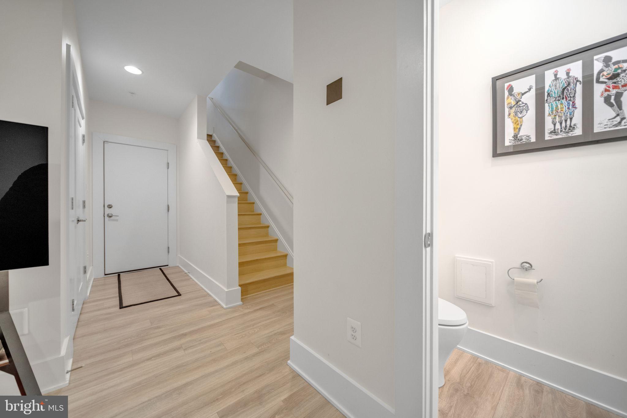 11326 Emerald Park Road Potomac, MD 20854 - Photo 31 of 40 Modern entryway with stylish staircase.