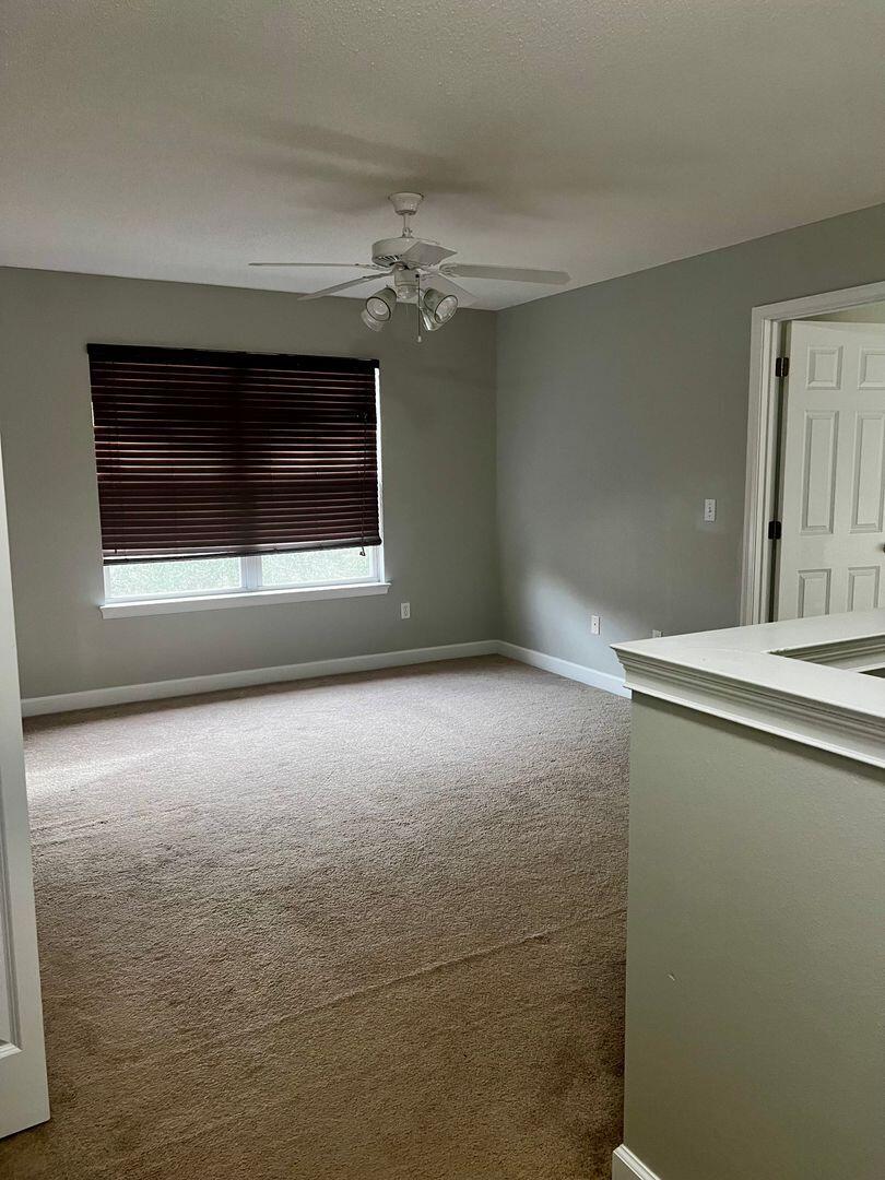 23 3rd Street Shalimar, FL 32579 - Photo 9 of 15 a view of kitchen and empty room
