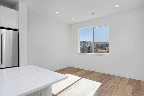 a room with a bed and a window