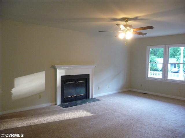 5001 Tulip Oak Road Chesterfield, VA 23832 - Photo 3 of 12 Den/Family/Great Room - Freshly painted and new carpet throughout! Enjoy this spacious family room with fire place!