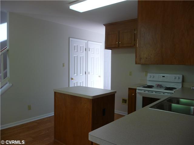 5001 Tulip Oak Road Chesterfield, VA 23832 - Photo 5 of 12 Kitchen - Island for extra counter space and dininf area!