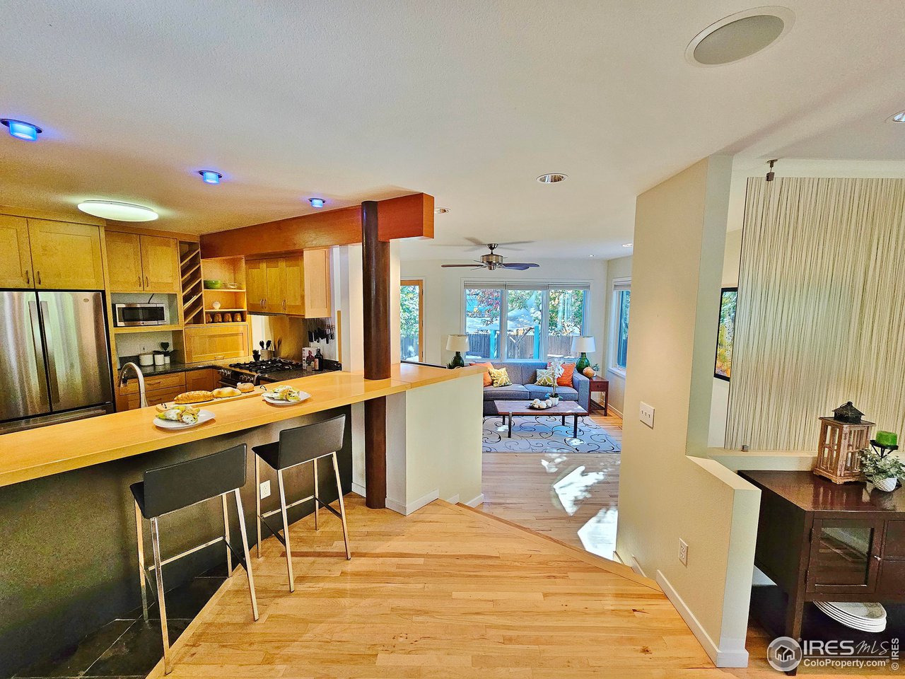 516 Valley View Drive Boulder, CO 80304 - Photo 11 of 35 Kitchen Breakfast Bar flows to Living Room